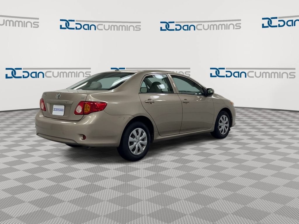 2009 Toyota Corolla 4dr Sdn Man (Natl)