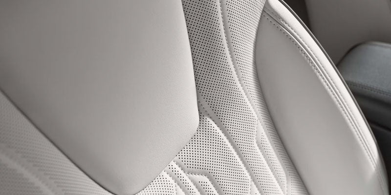 Perforated leather-appointed seats with a unique quilted stitching pattern